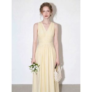 Yellow sleeveless V-neck dress 2026 women's summer new style French gentle style high-end waist-length long skirt